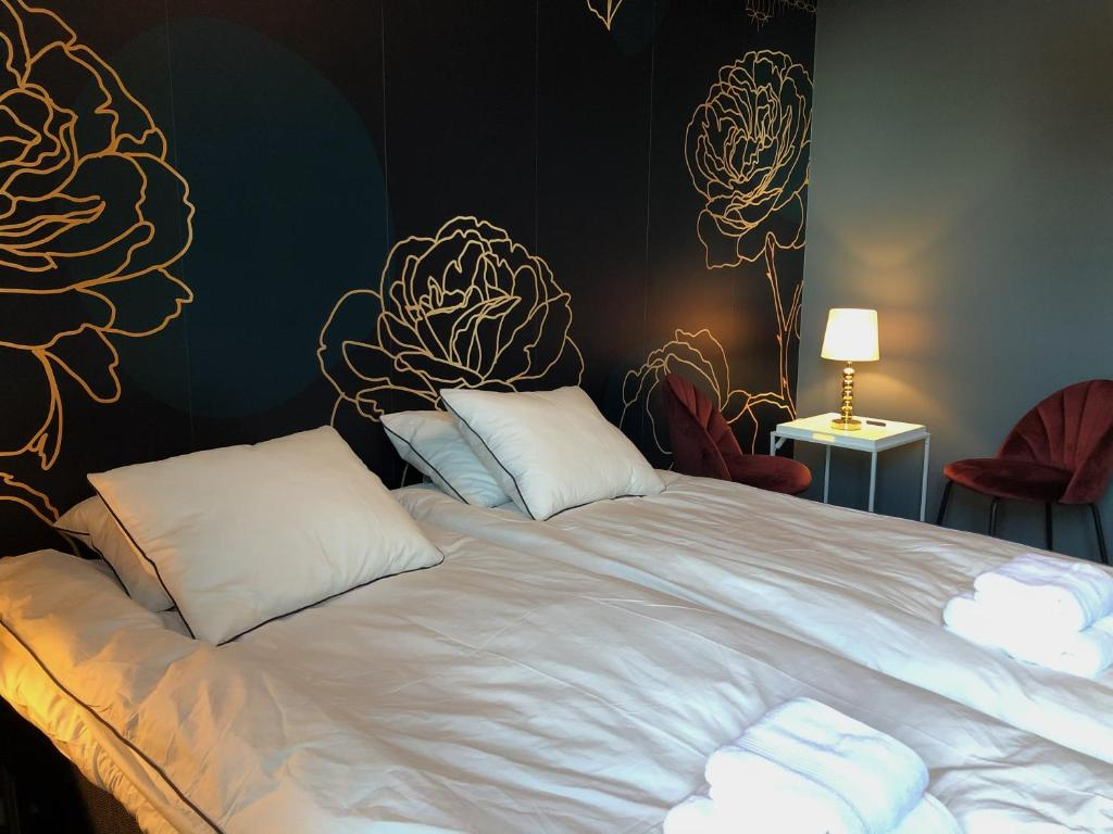 Family room with beds and bunk bed at Mini-Hotel Borås