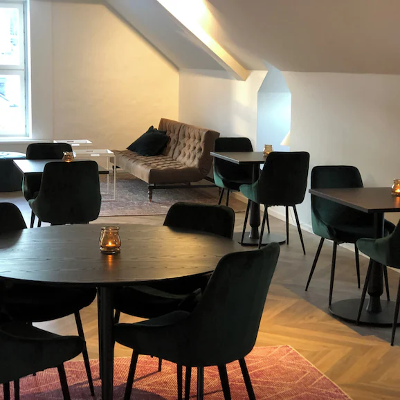 Shared guest kitchen with cooking equipment at Mini-Hotel Borås