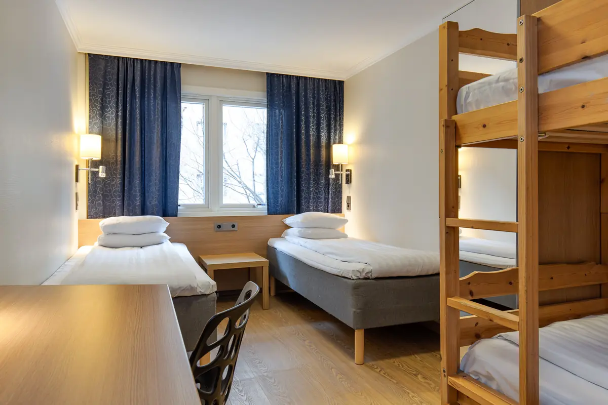 Family room with double bed and bunk bed at Mini-Hotel Göteborg